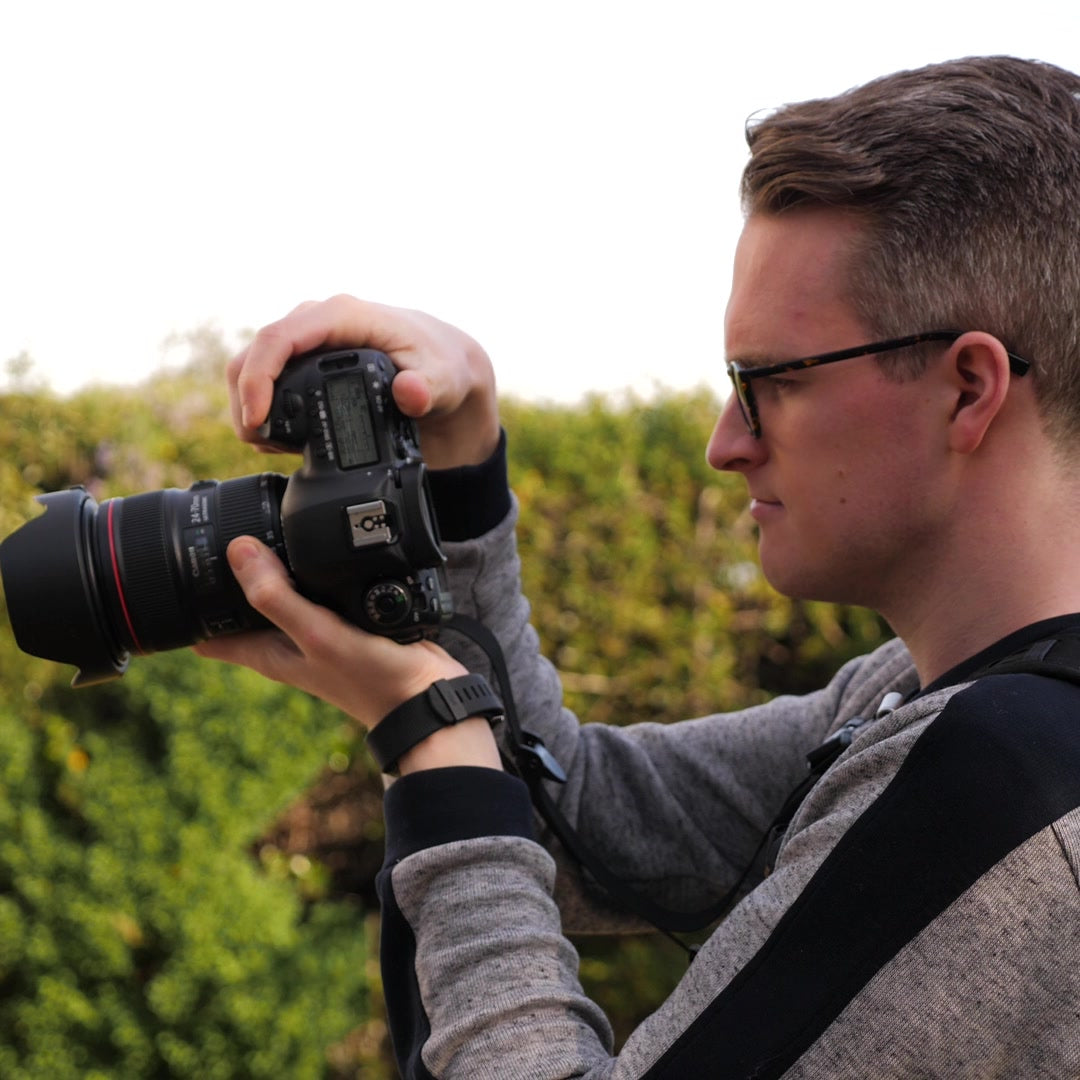 Josh using his camera while teaching exposure
