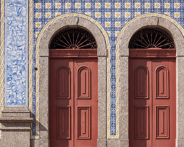 A symmetrical pair of ornate doors photographed by Stuart Price