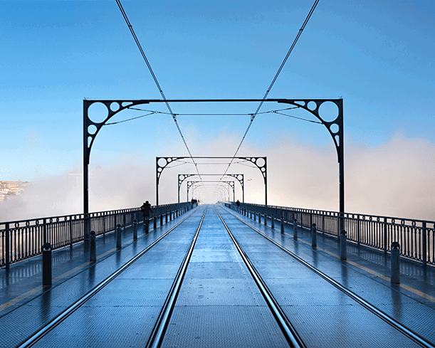 A misty bridge using leading lines, photographed by Stuart Price